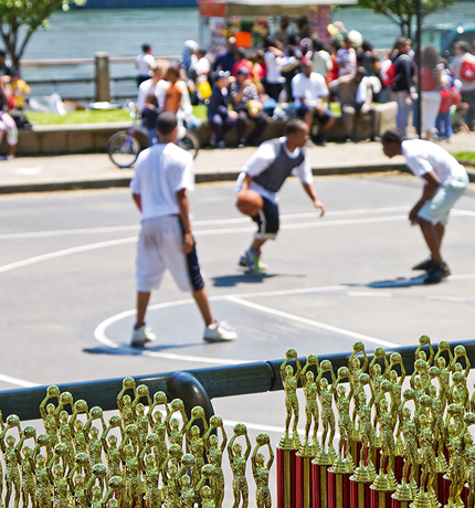 basketball tournament with trophies in the forground