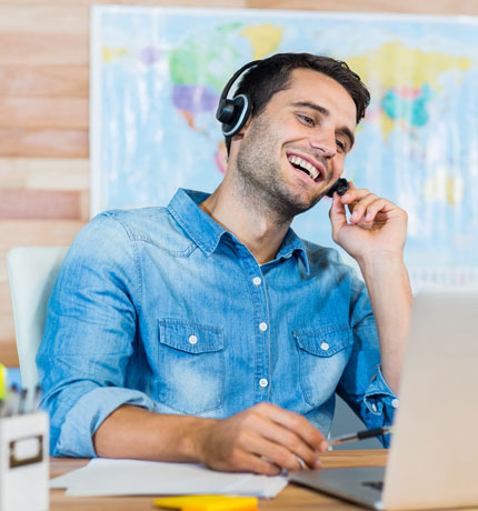 travel agent on the phone with a customer