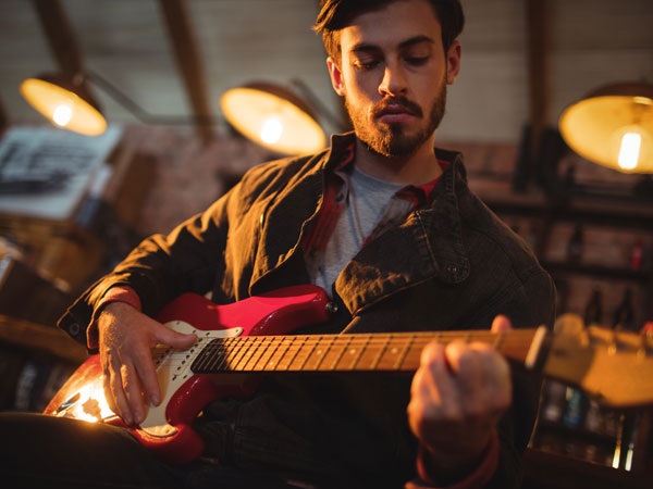 man playing guitar