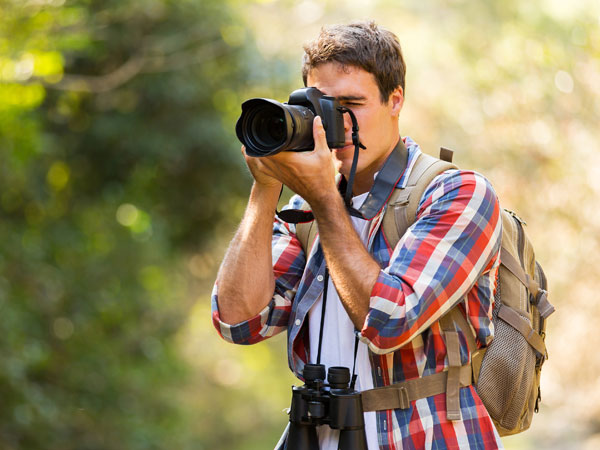 photographer taking pictures out in nature