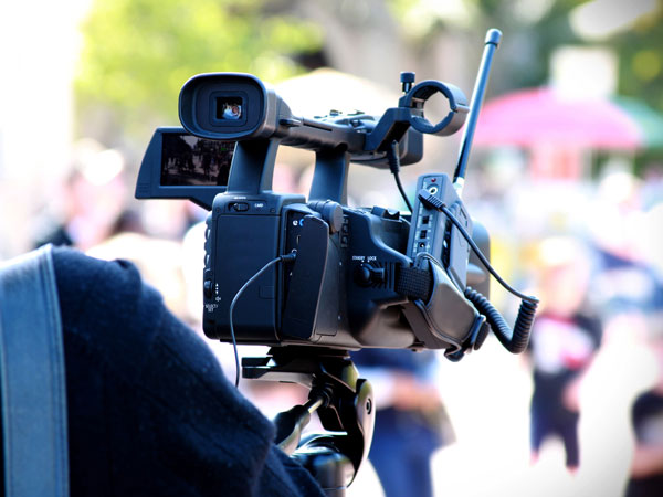 Video camera positioned at crowd