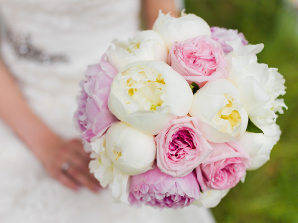 bride with the focus on her flowers